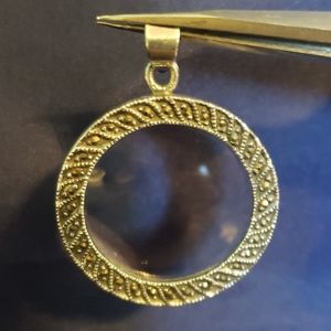 Antique finished magnifying pendant